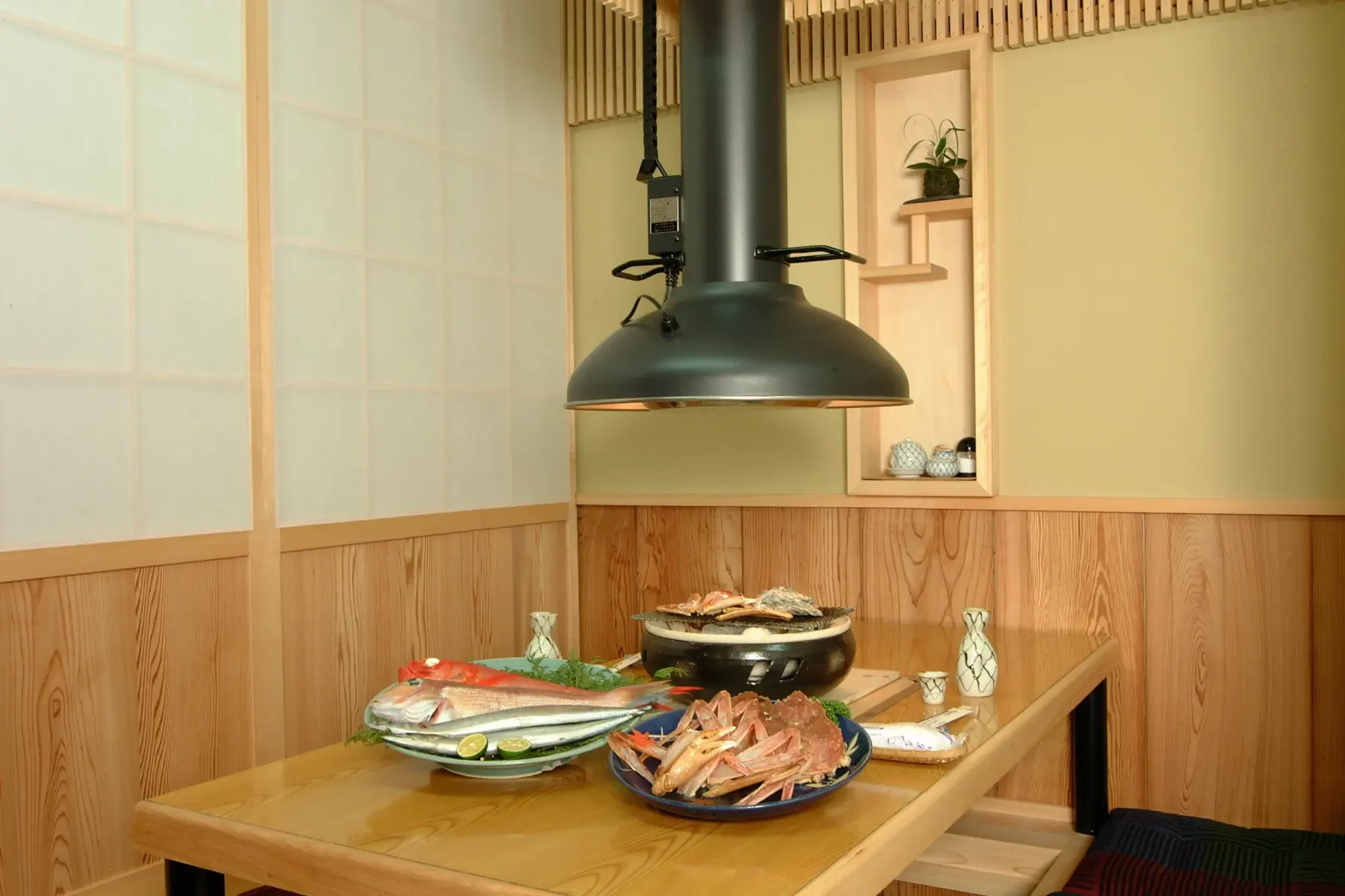 A private room with horigotatsu (sunken-floor) seating