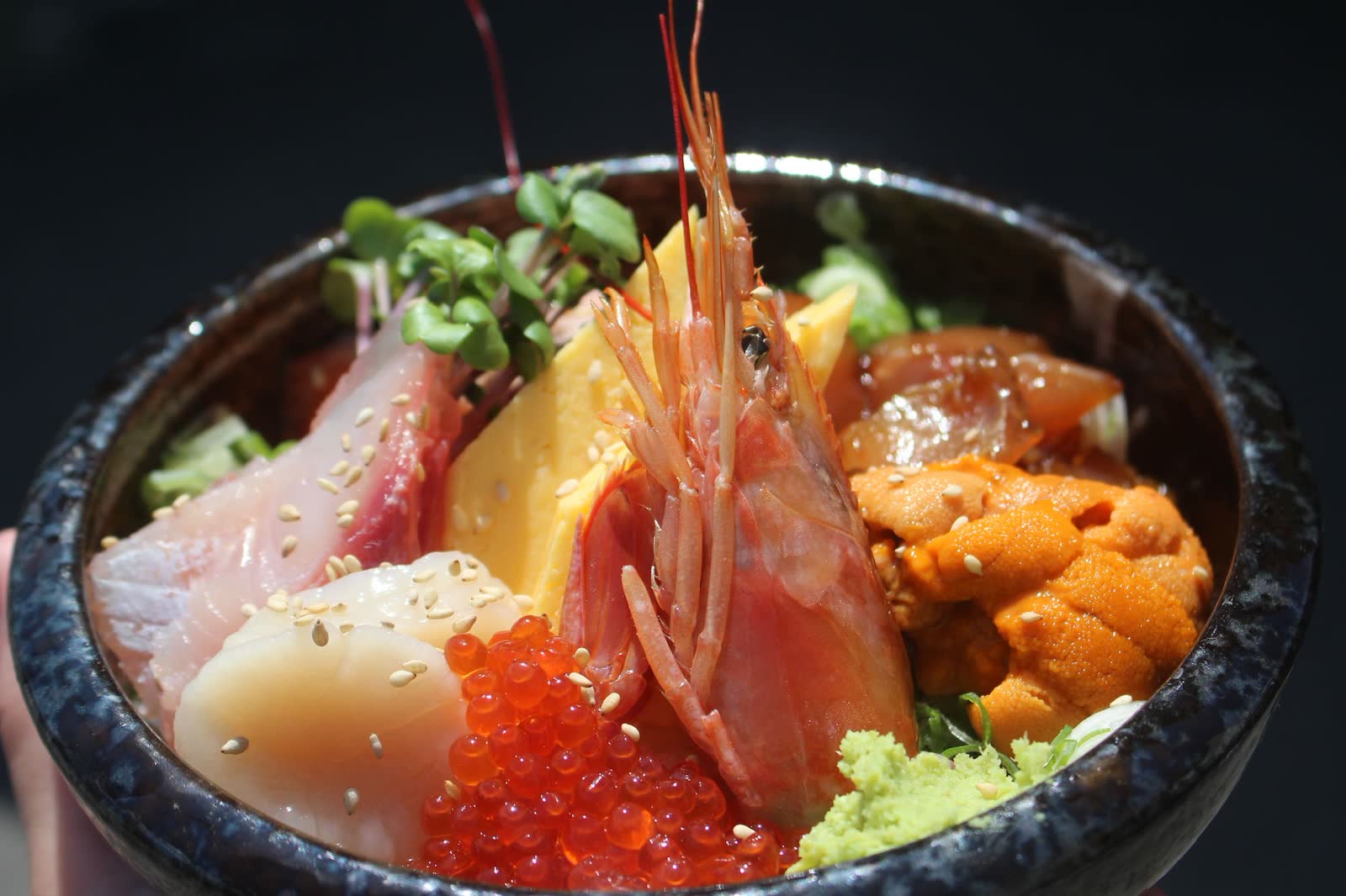 A kaisen-don rice bowl topped with the season's seafood